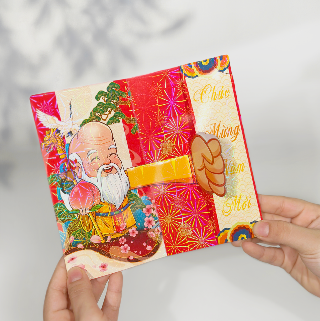 Mẫu bao lì xì thần Tài cầm trái đào tiên - Vượng khí tràn đầy, tài lộc bừng sáng